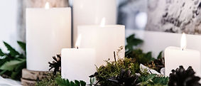 White Candles with Plant Decor