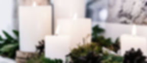 White Candles with Plant Decor