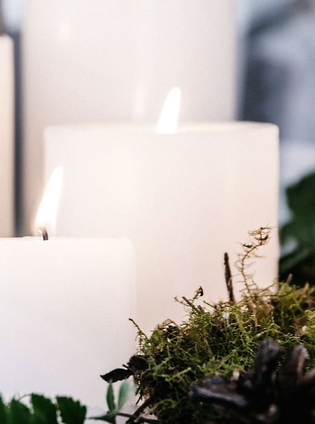 White Candles with Plant Decor