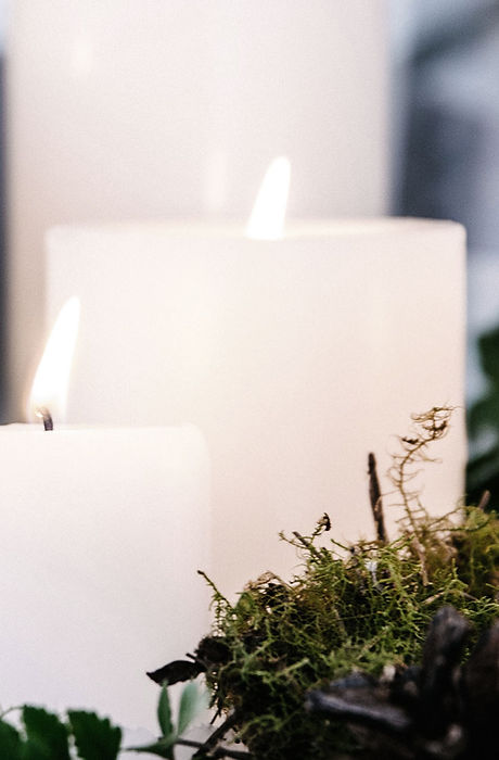 White Candles with Plant Decor