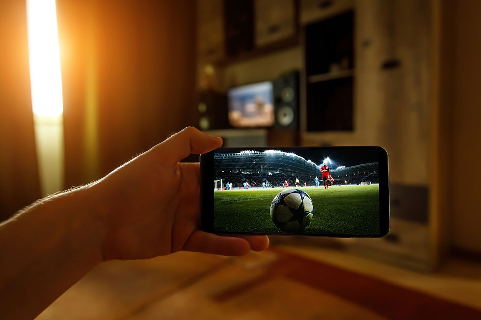 watching-football-game-home-via-smartphone-broadcasting-soccer-from-stadium.jpg