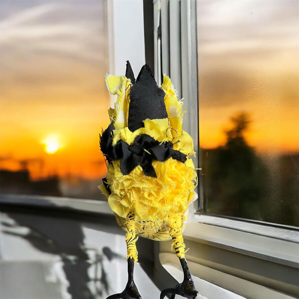Thumbnail: Feathered butt view of the American Goldfinch fabric art sculpture
