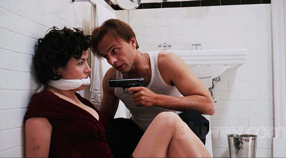 Jennifer Tilly et Joe Pantoliano dans Bound.