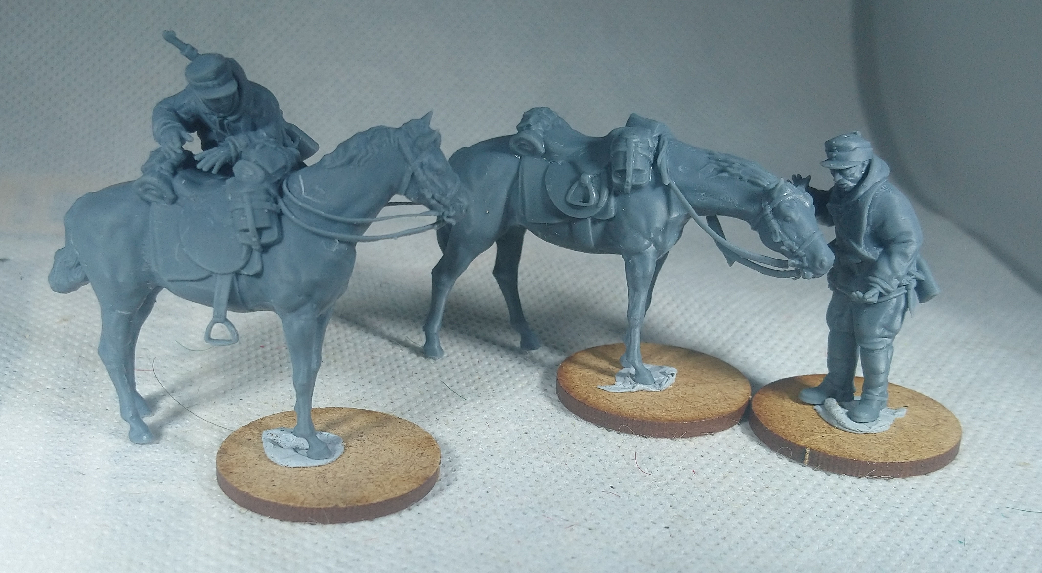 2 Late War German cavalrymen with holding/geting on horse .