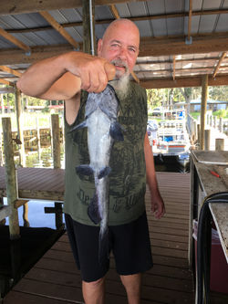 Guest showing off a trophy bass caught near Rivers Edge RV Park on the St. Johns River