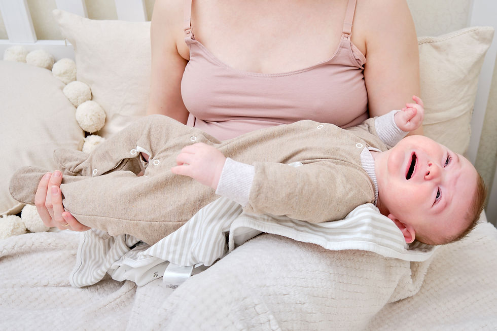 Mother struggling to breastfeed | Parents You've Got This