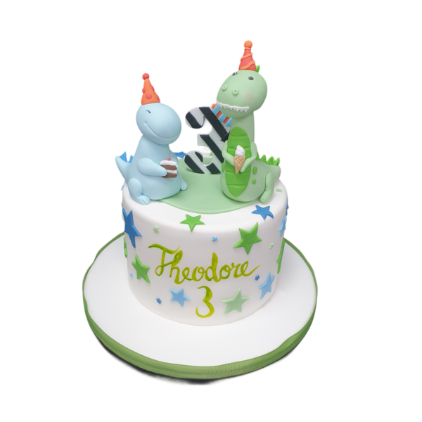 Bespoke celebration cake with colorful party dinosaurs and balloons in Solihull, West Midlands.
