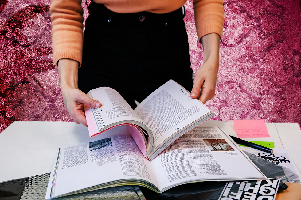 A woman gathering inspiration for her social media feed for Spill Social