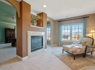 Real Estate Photography Master Bedroom with fireplace
