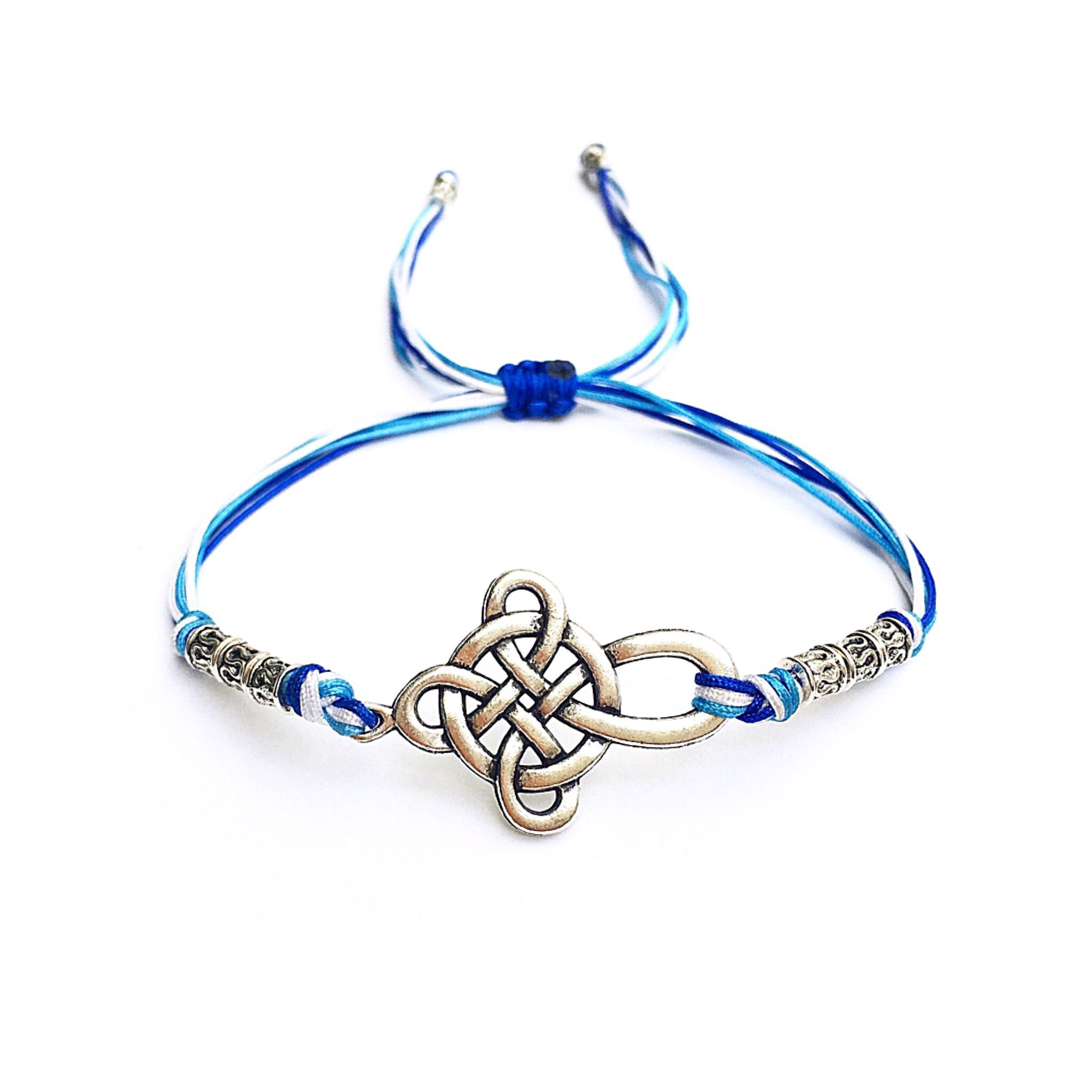 Bracelet style ethnique gothique religieux CROIX CELTIQUE. NOEUD CELTIQUE. AMOUR. INFINI. MOTIF CELTIQUE Bleu-Blanc