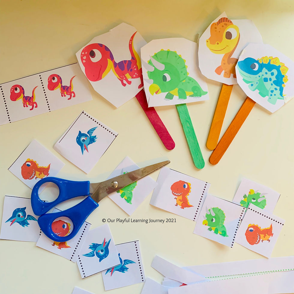 Dinosaur pictures cut out to and stuck to popsticks to make dinosaur puppets