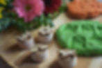 fun playdough play ideas for kids - Playdough on a wooden board with some homemade playdough stamps