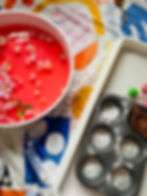 Fizzy potion play for kids using bicarb powder and coloured water.