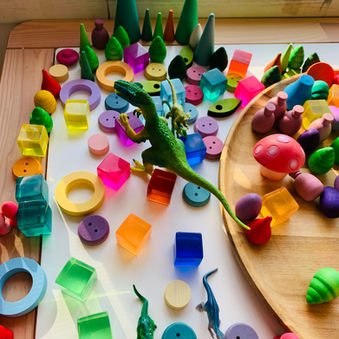 dinosaur play with lucite cubes.JPG