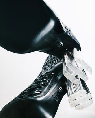 a pair of black shoes made in spain