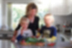 Bek Nutter, naturopath, with her children in their kitchen preparing a healthy meal