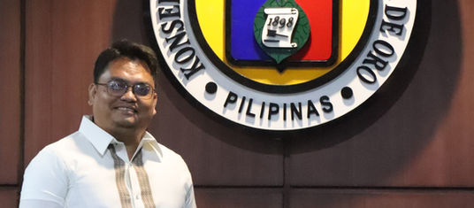 Achas sits as minority floor leader