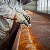 robin092111_Industrial_rust_remediation_process_in_action_sho_bf1042d6-e4f7-4302-a64d-8da8