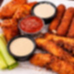 Chicken fingers wings and mozzarella sticks served together at Charley's in Lynchburg VA