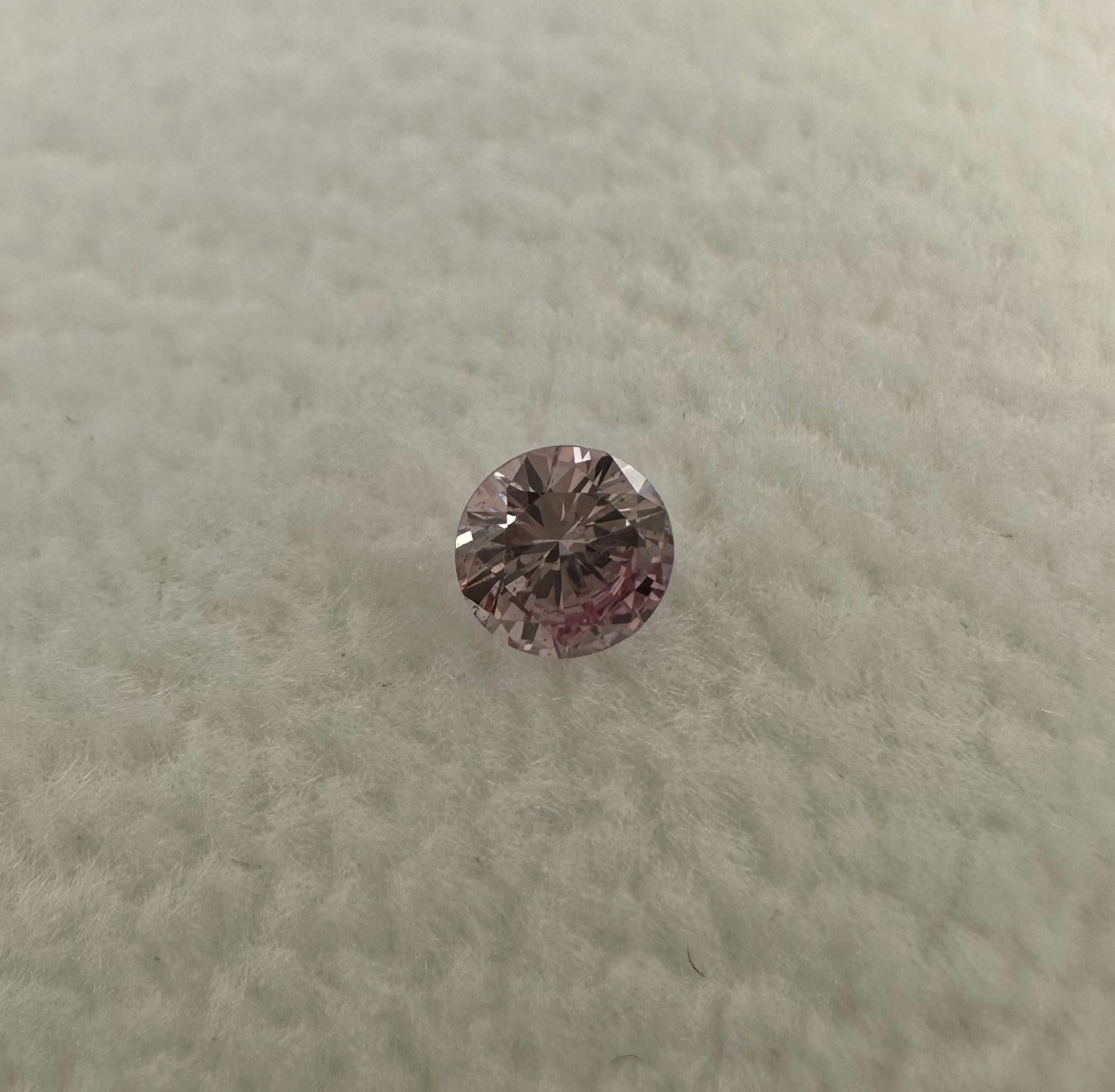 0.103ct round brilliant cut 7PP Argyle Pink Diamond