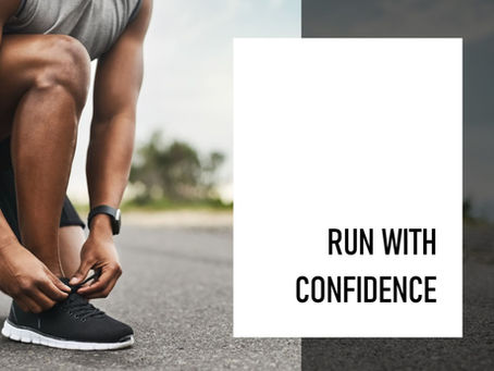 A runner tying their shoes before going on a run