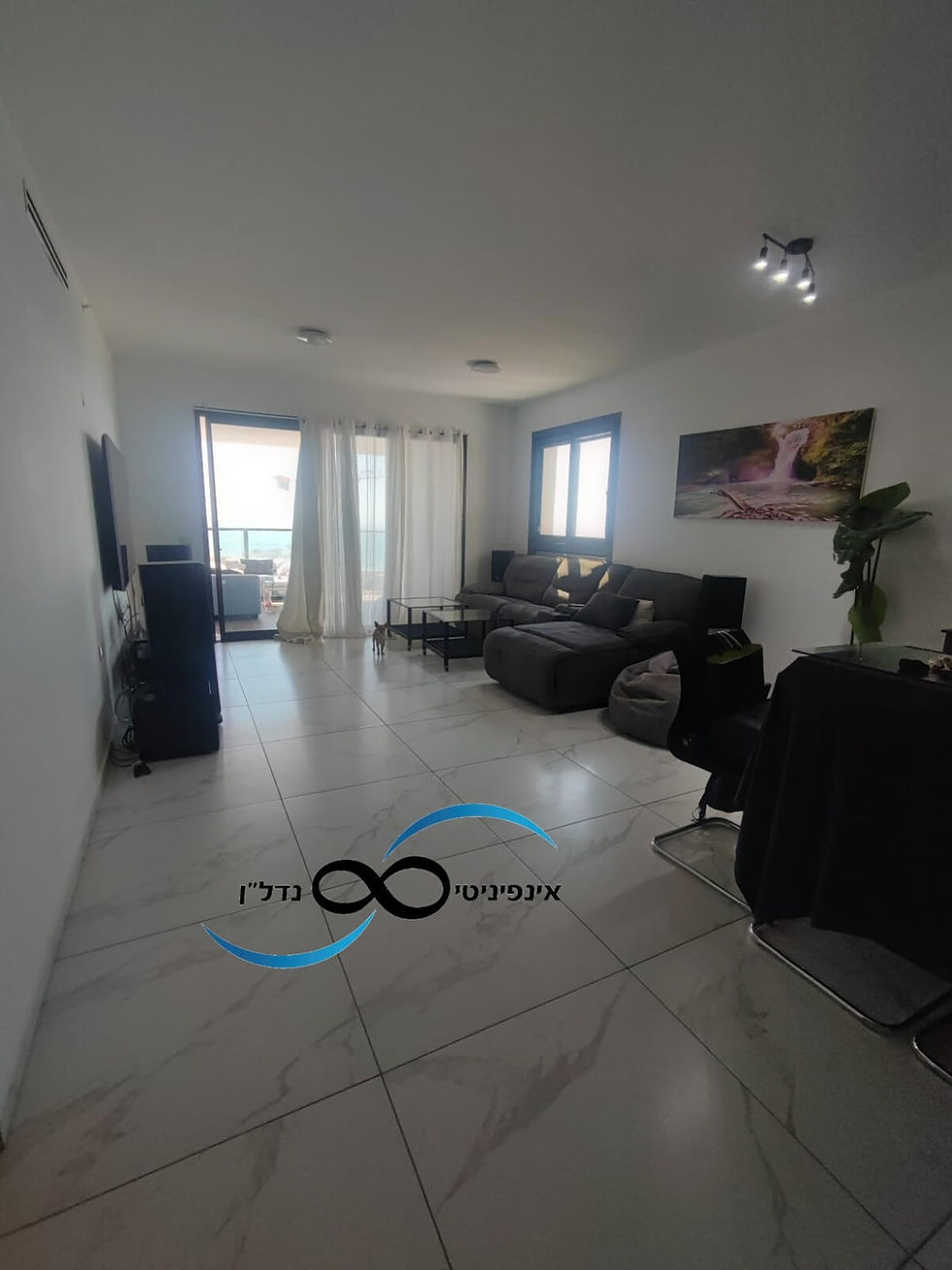 רועי לבקוביץ | אינפיניטי נדל"ן | פרימיום קארד | כרטיס הביקור שלי