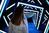 Girl stands in front of LED volume