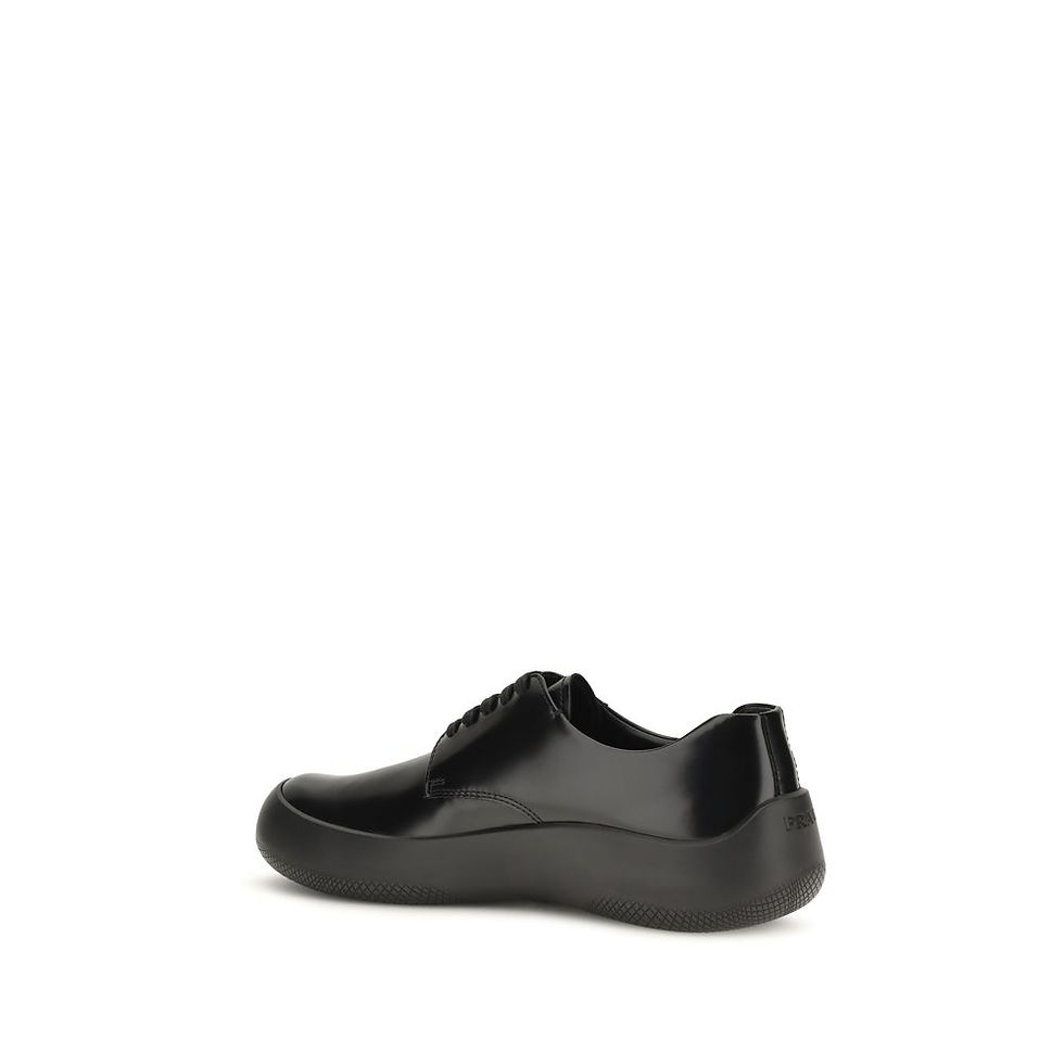 Thumbnail: Prada Black Calf Leather Bos Taurus Low Top Sneakers