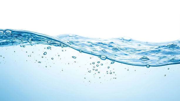 A serene image capturing the gentle ripples of water under soft, diffused light The water