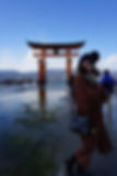 Bianca in front of the famous torii gate on Miyajima island, Hatsukaichi