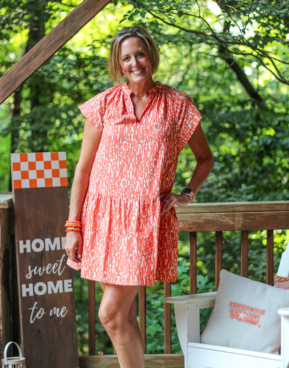 Orange and white print short dress
