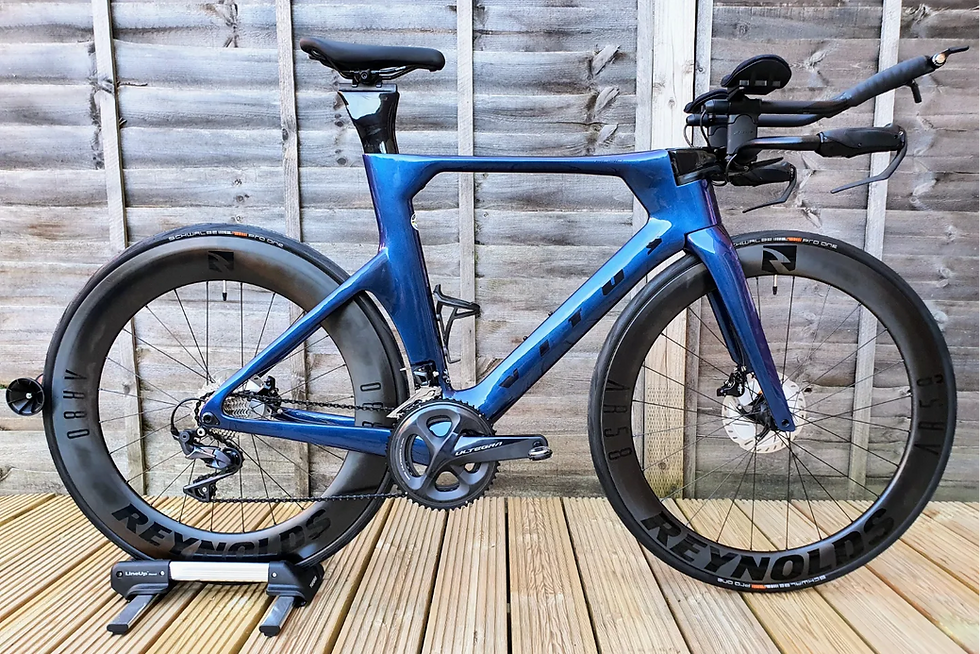 Close-up view of a bicycle repair station with tools and parts