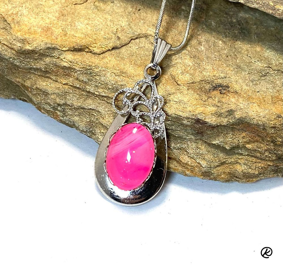 Pretty pink pendant from poured acrylics