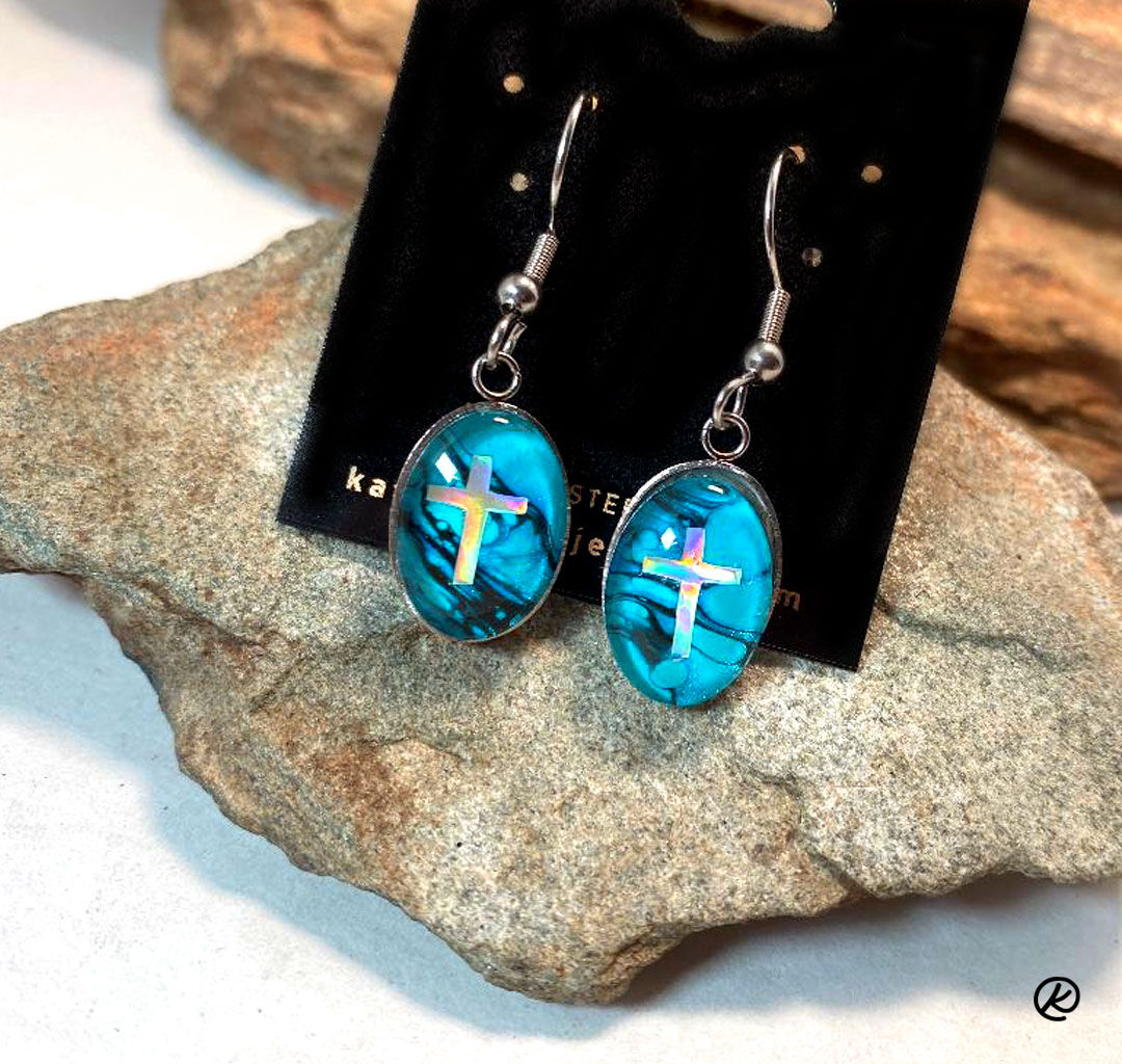 Turquoise and black earrings with holographic crosses