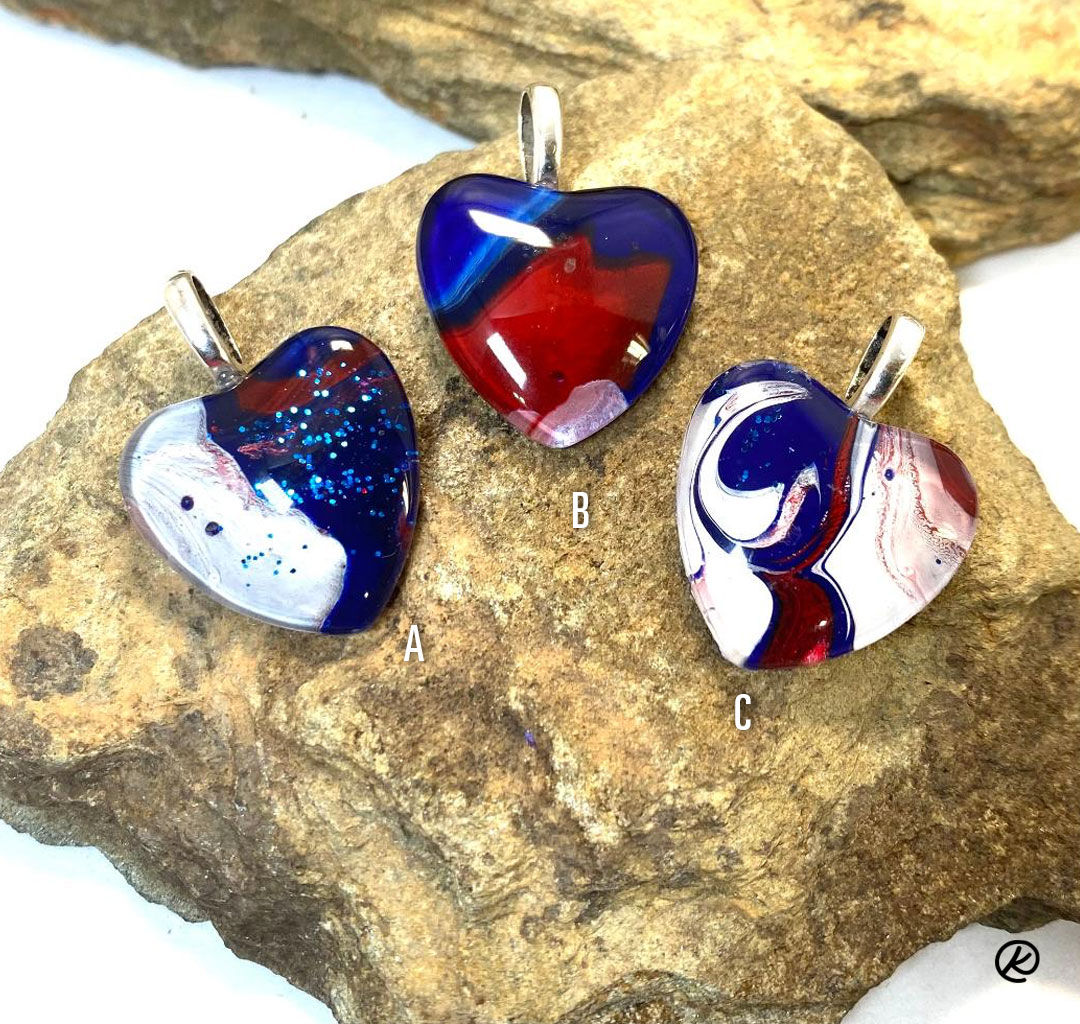Medium sized heart pendants in red white and blue poured acrylics