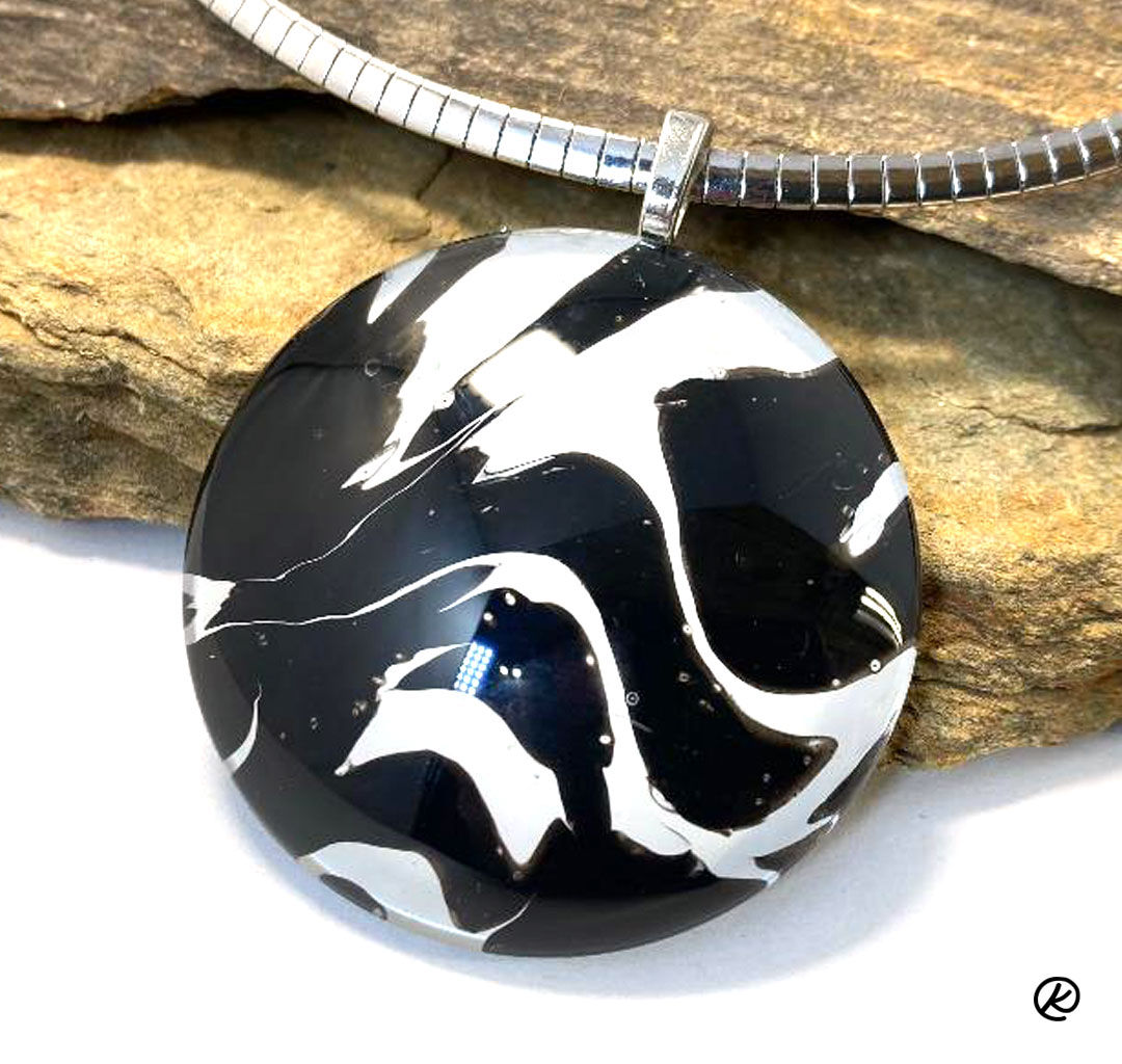 Stunning black and white poured acrylic pendant