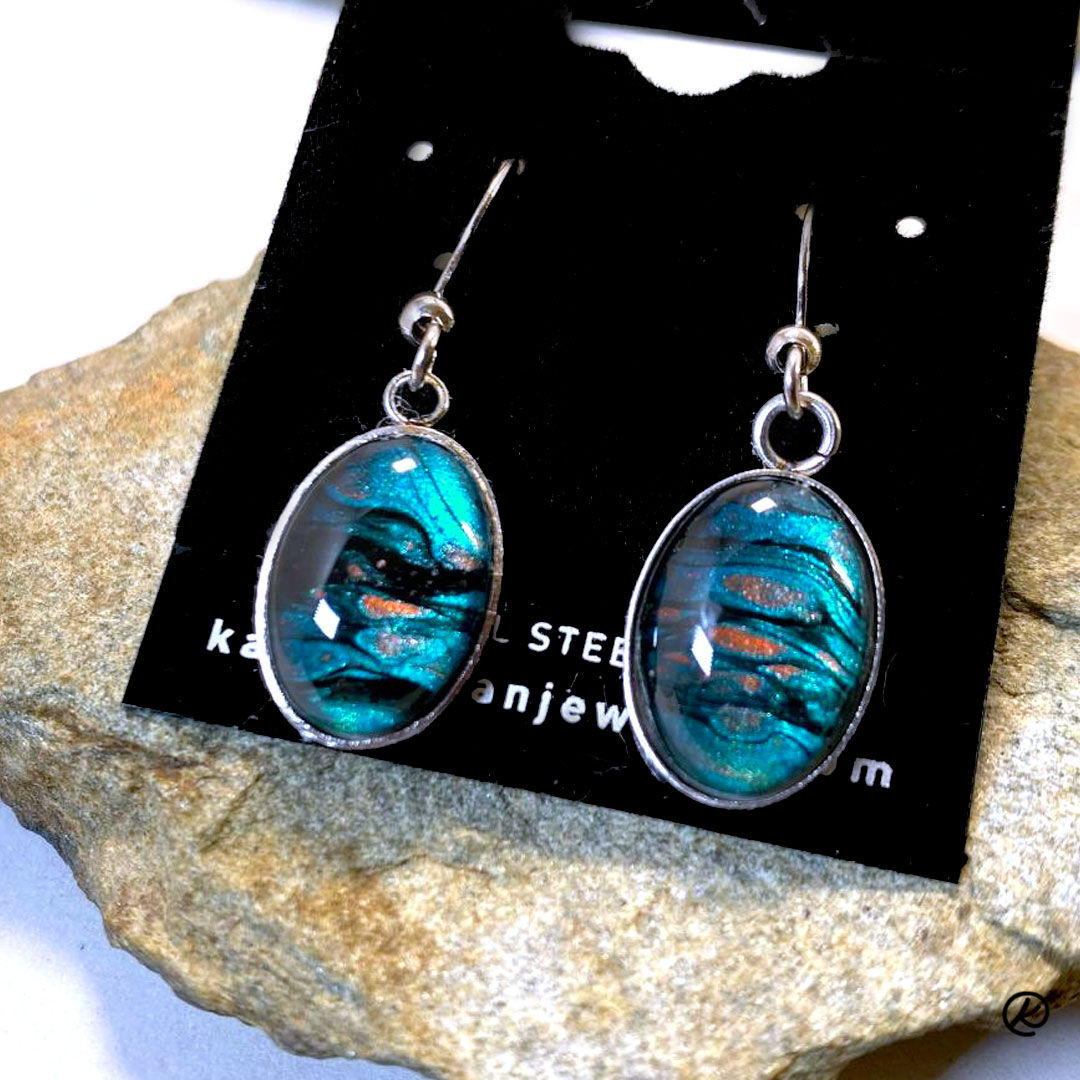 Poured acrylic earrings in surgical steel