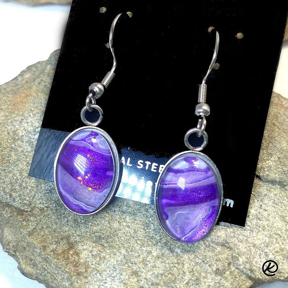 Thumbnail: Small oval pendant set in pretty purples