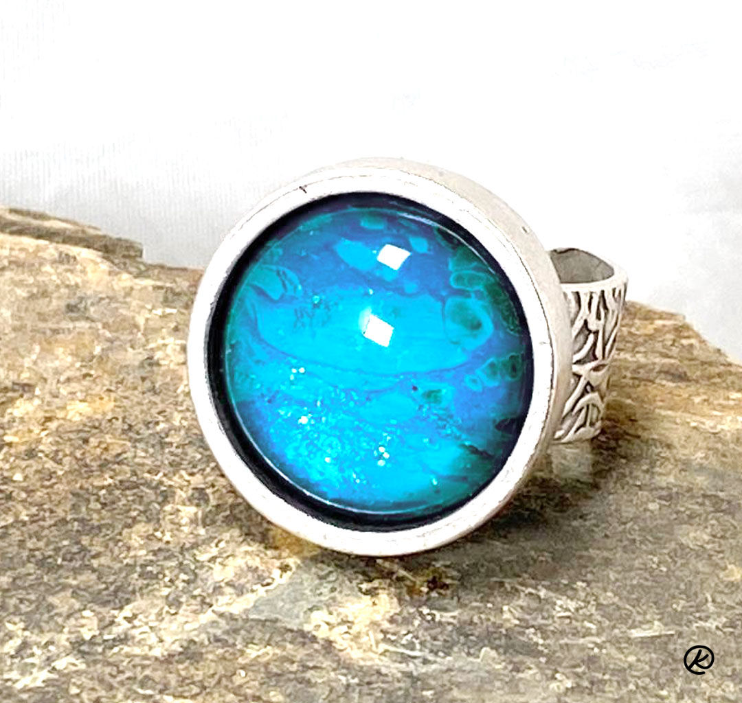 Color Shift turquoise poured acrylics in adjustable ring