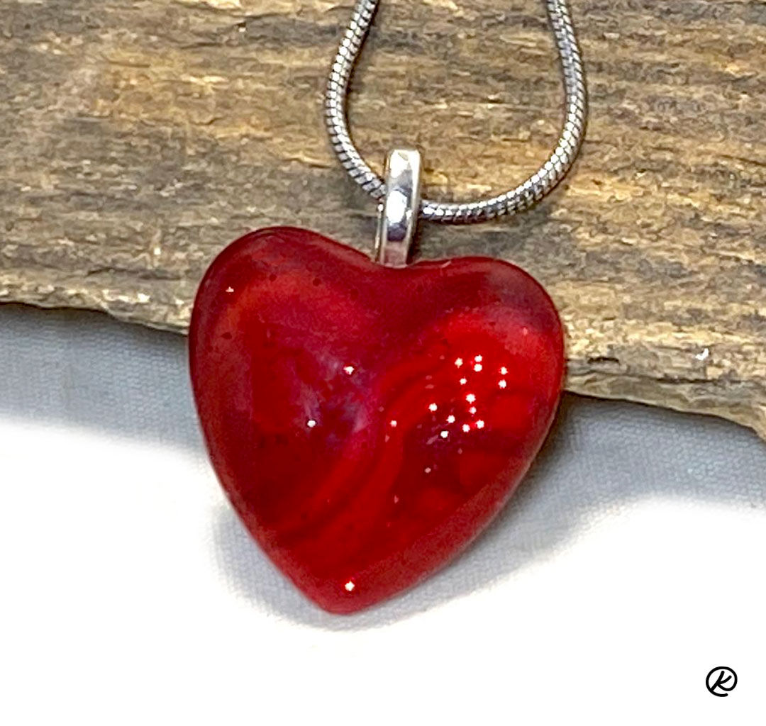 Sparkly red heart pendant in poured acrylics