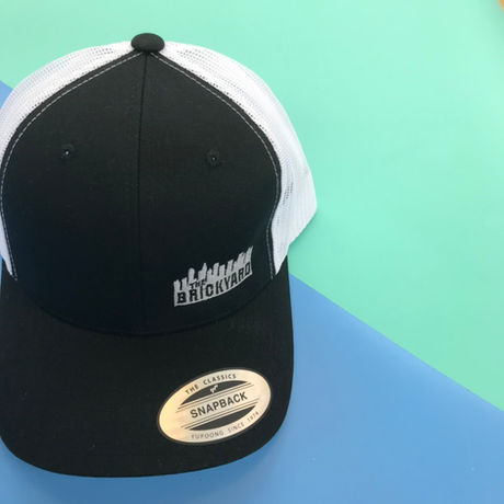 Contractor mesh trucker hats with custom logos, perfect for workwear and company branding.
