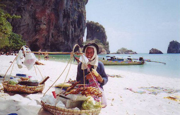 Papaya salad hawker lady on the beach
