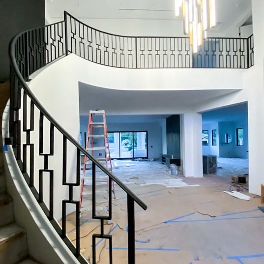 a beautiful custom railing for this exterior home fabricated and installed by us and delivered to happy customers on time and on budget