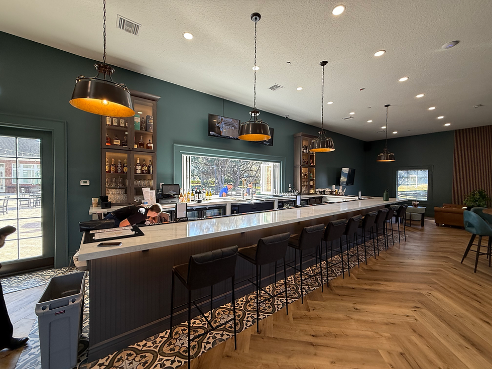 The Citrus Club bar area at The Grove featuring seating, cocktail service, and indoor lounge space.