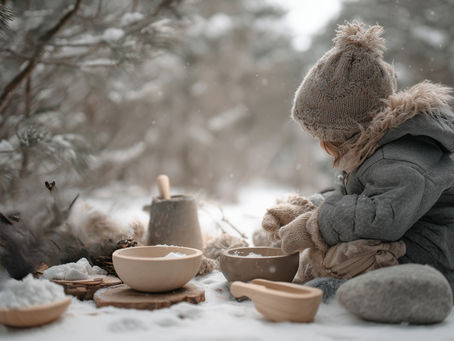 A child in full snowsuir playing in the nordic snowy forest