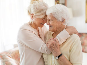 daughter hugging mother