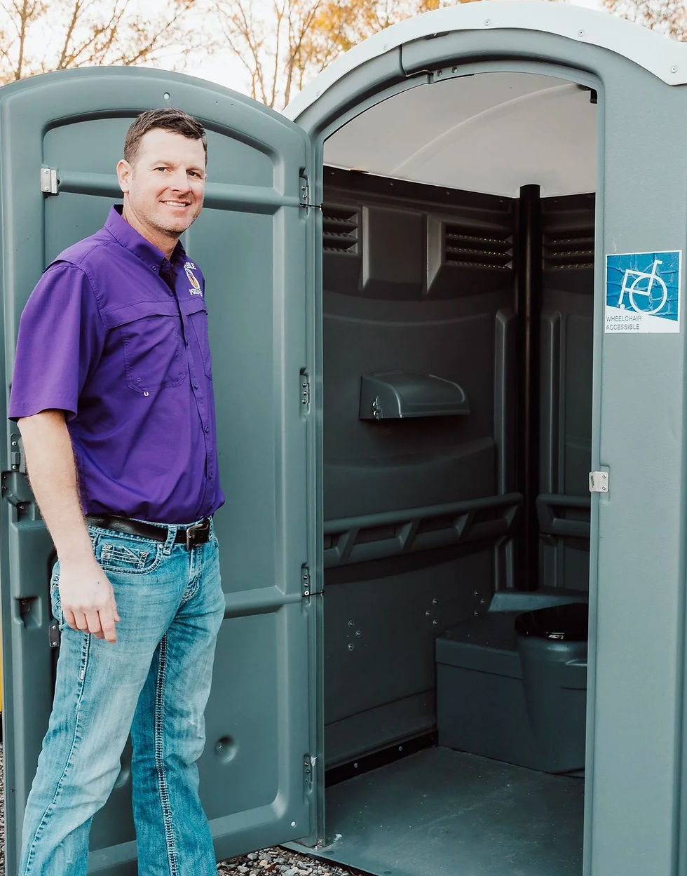 Handicapped Bathroom with co-founder of reliable portables