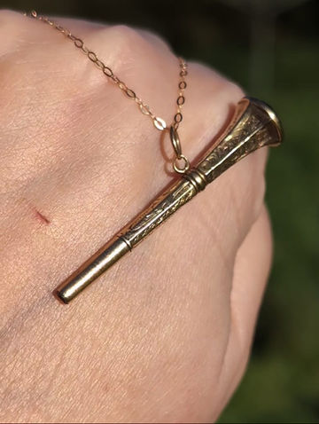 Thumbnail: large yellow gold victorian pocket watch key fob with a carnelian intaglio on one end