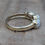Thumbnail: vintage 14ct yellow gold ring set with three oval cabochons of Gilson precious opal