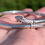 Thumbnail: An antique sterling silver snake with ruby eyes bangle